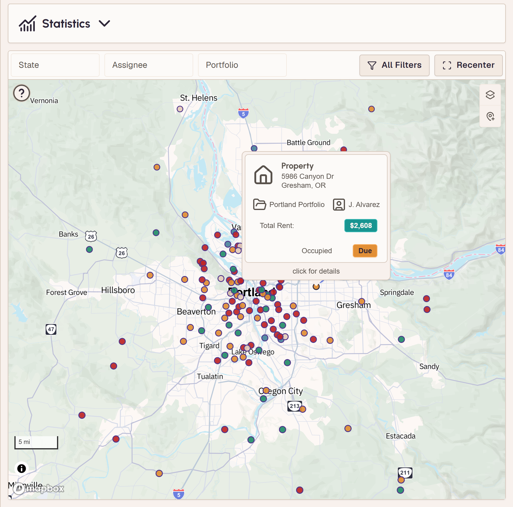 A metro-wide portfolio on the VestaGlass map with a property card open, showing its portfolio, its assignee, its rent, and that it is occupied and due.